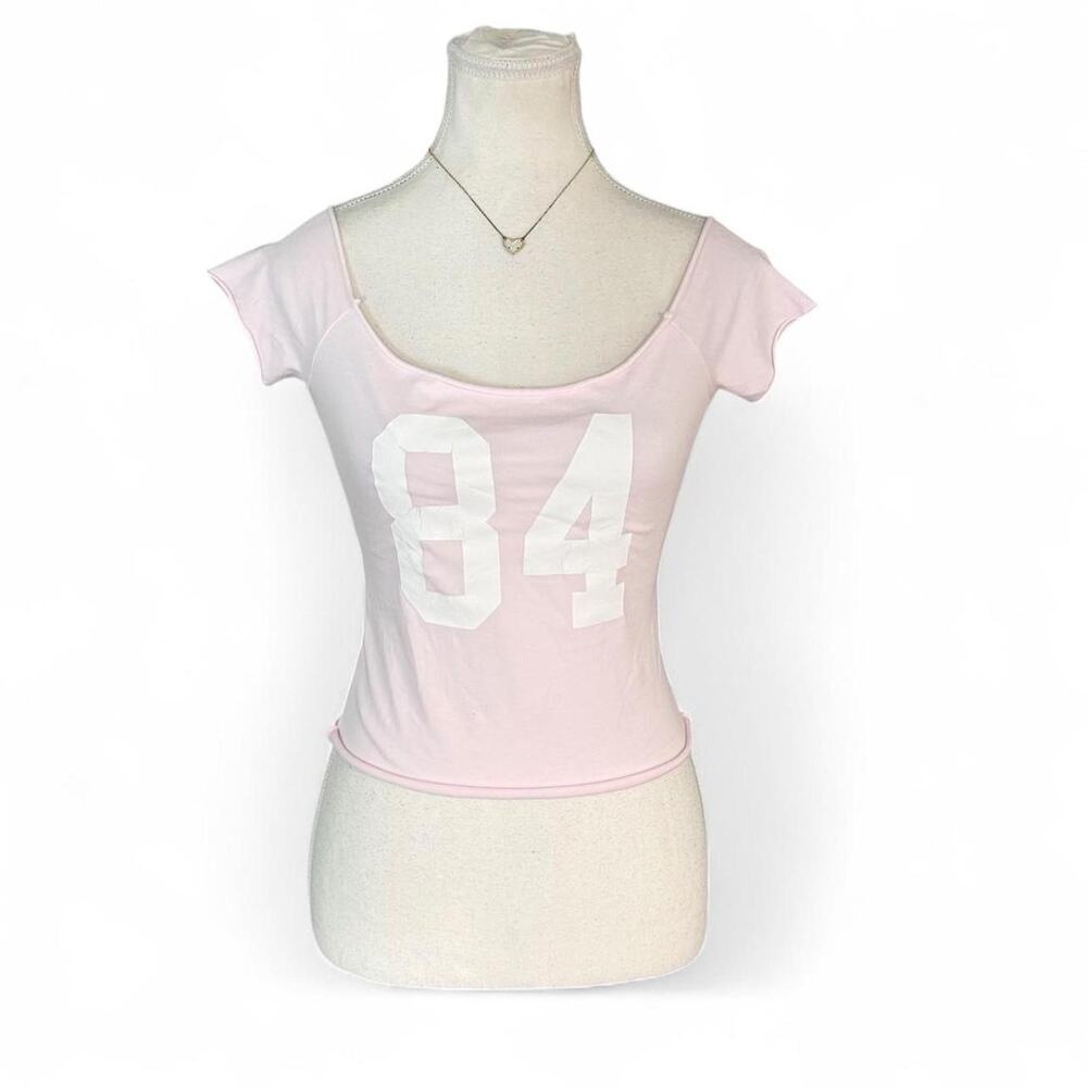 Brandy Melville baby pink off the should jersey 84# cotton top with white number